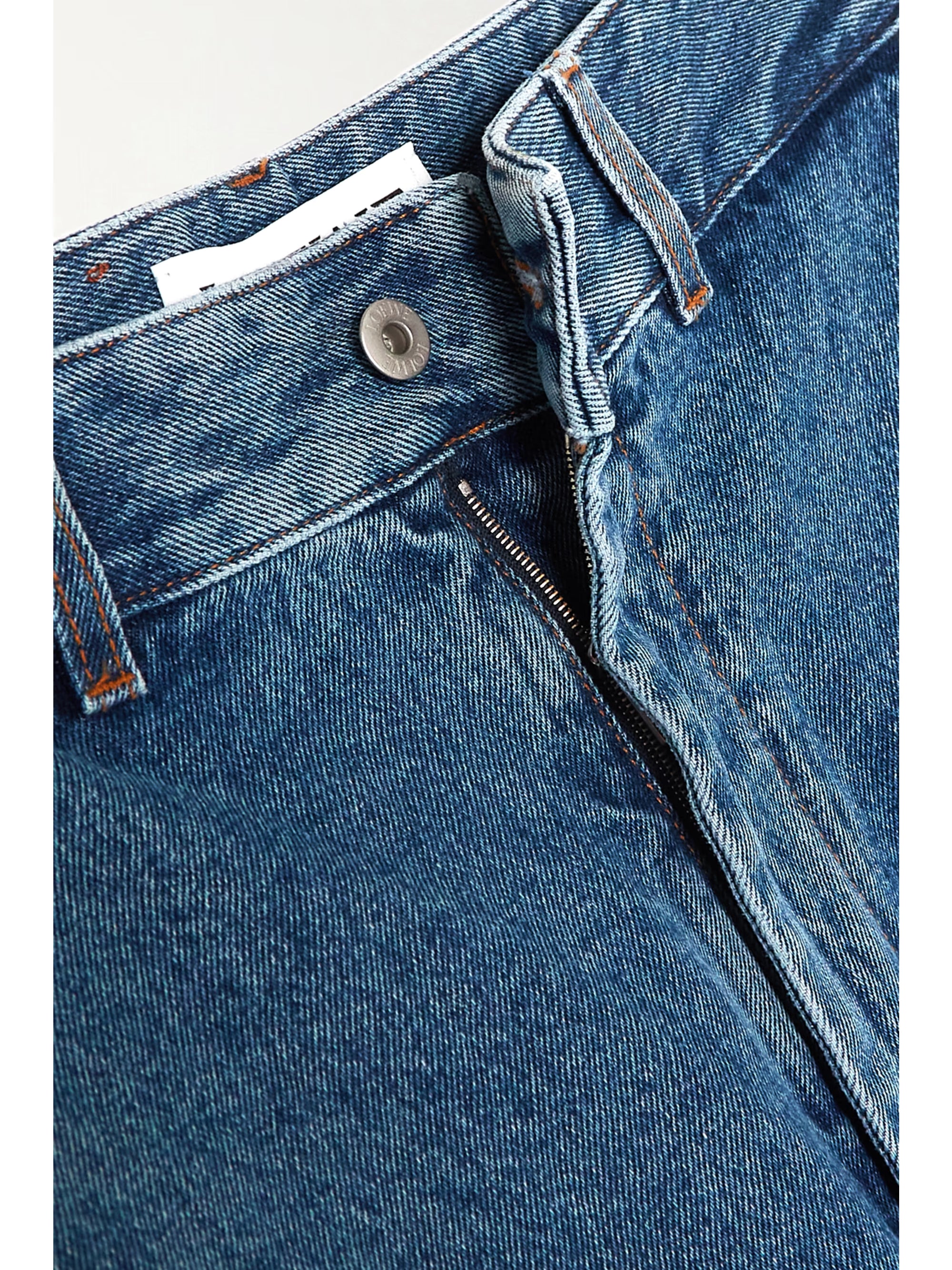 DIORA – High-Waist Jeans mit Signature-Motiv